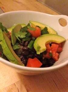 fresh avocado, tomato, cilantro and jalapeno top beans and rice